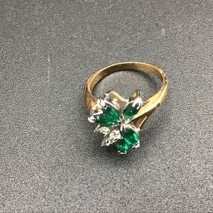 Goldtone/Silvertone Ring with Clawset White and Green Rhinestones size 7.